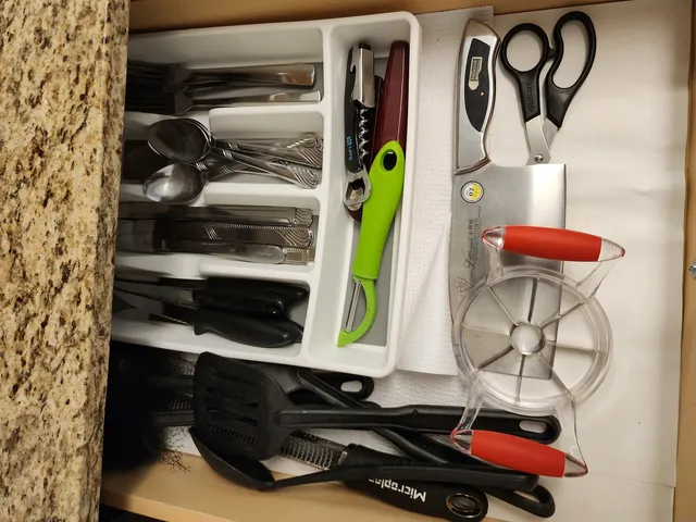 a room with lots of books and mirrors