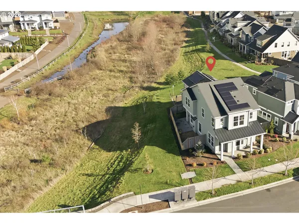 a aerial view of residential houses with outdoor space