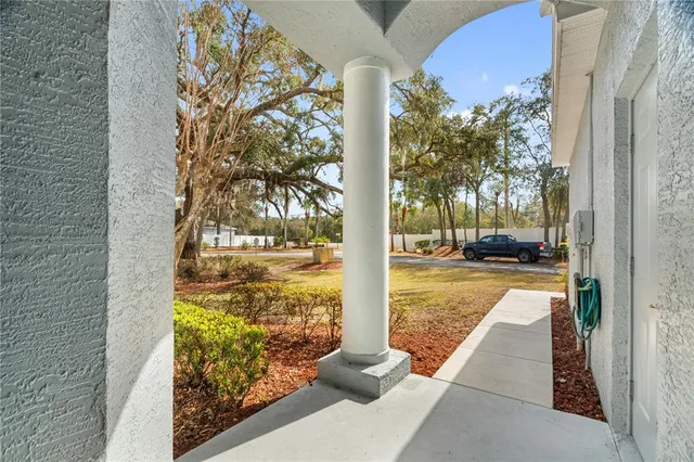 a view of kitchen with furniture and wooden floor