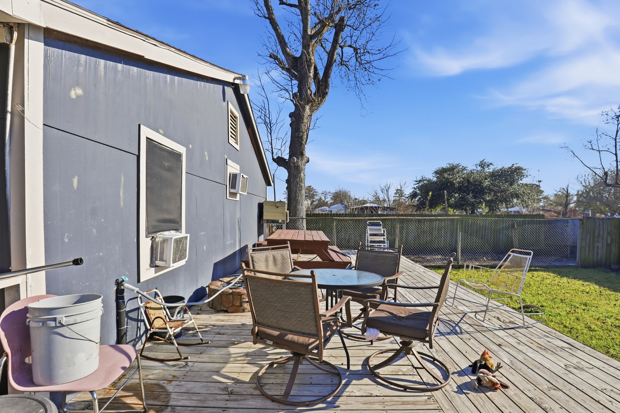 829 Becker Street Channelview, TX 77530 - Photo 14 of 19 a view of a chairs and table on the terrace