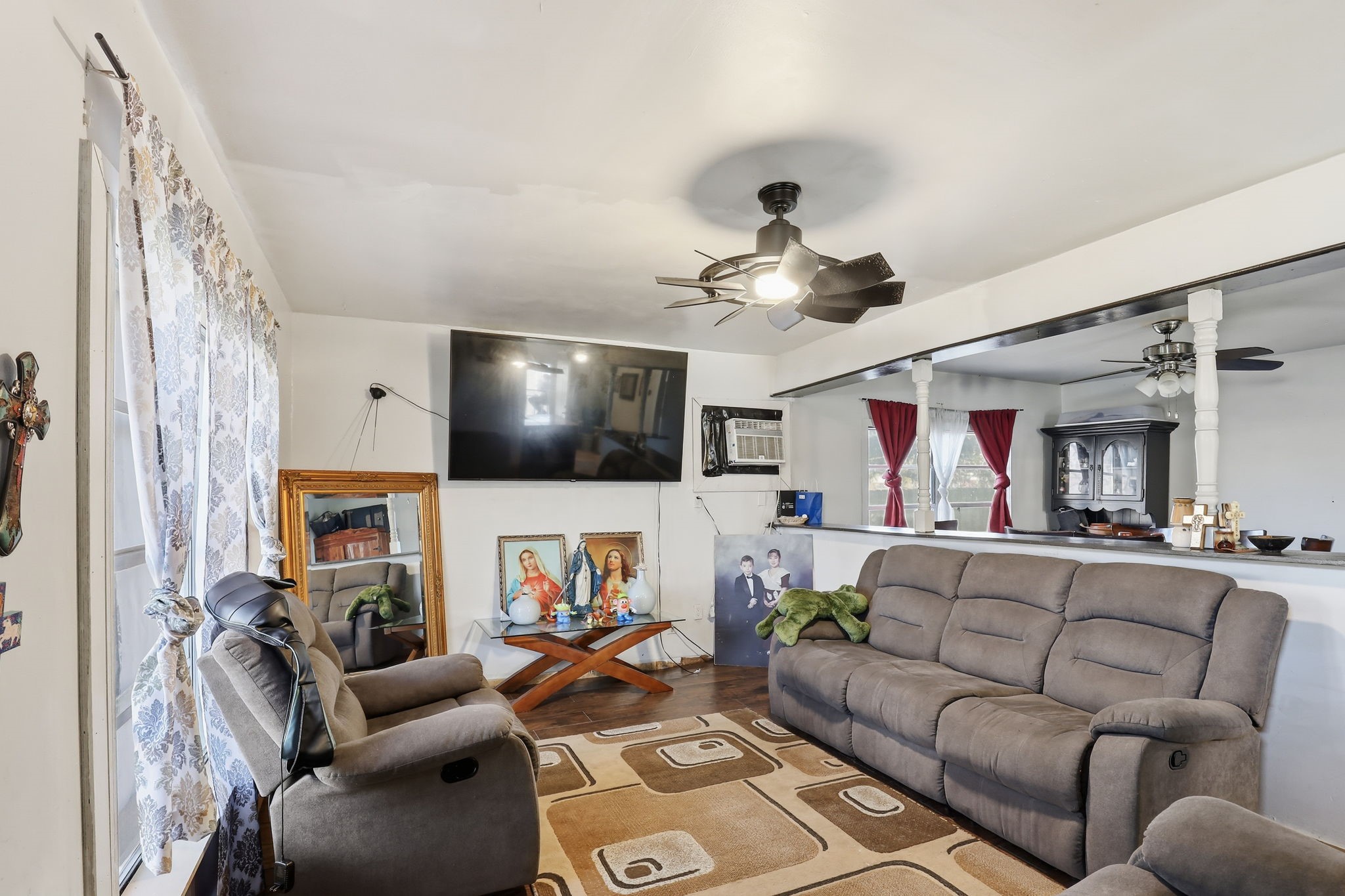 829 Becker Street Channelview, TX 77530 - Photo 17 of 19 a living room with furniture and a flat screen tv