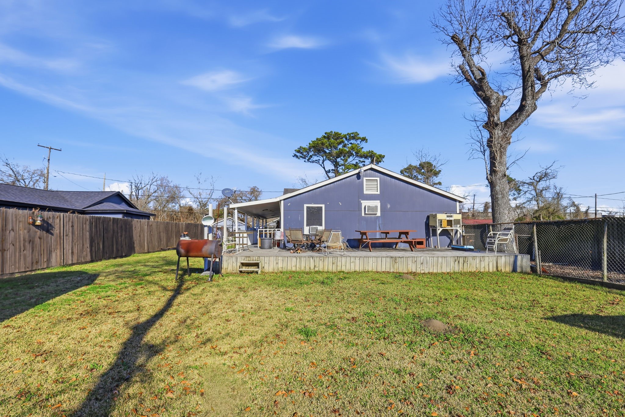 829 Becker Street Channelview, TX 77530 - Photo 18 of 19 a house view with a sitting space and garden