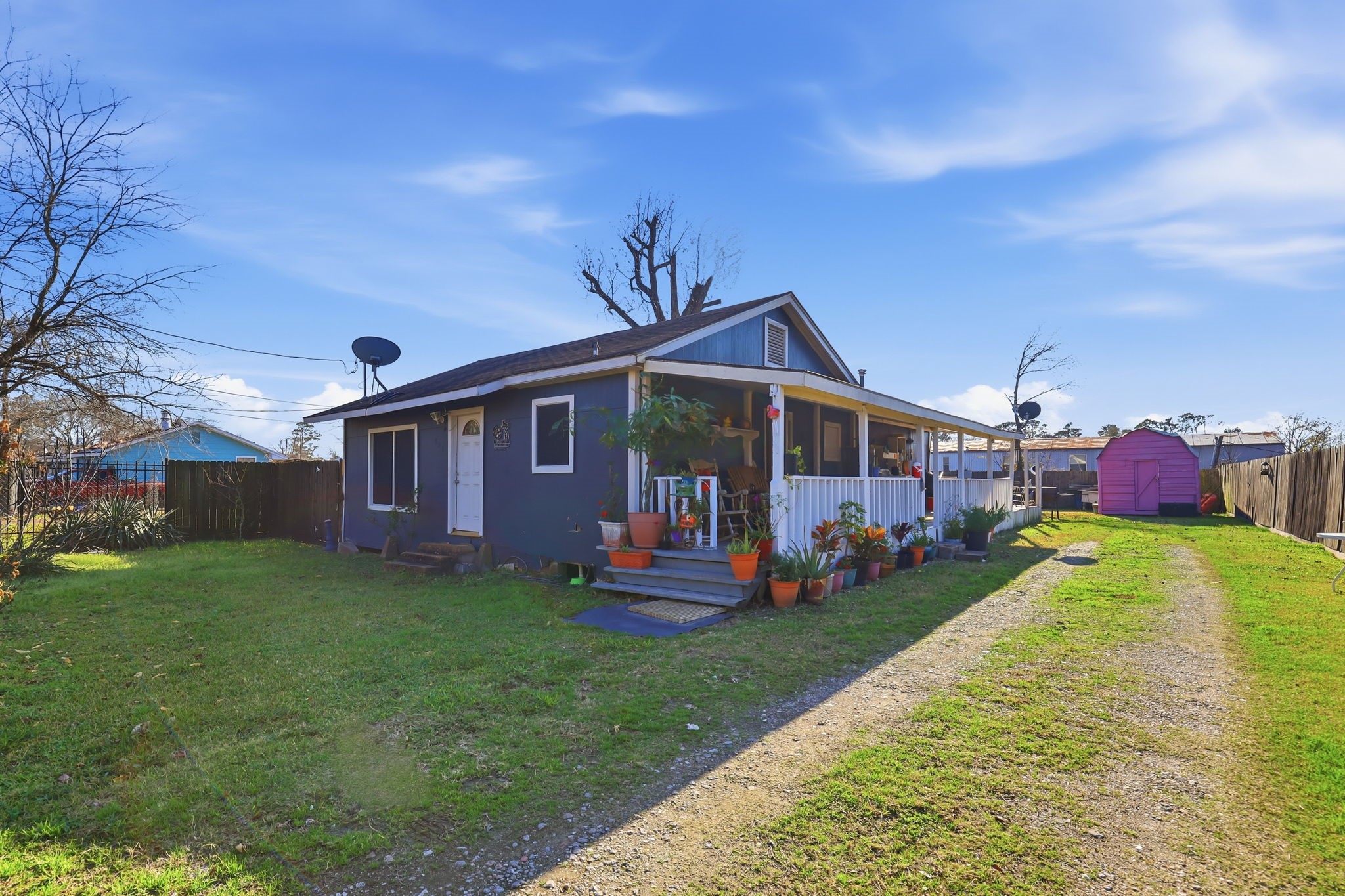 829 Becker Street Channelview, TX 77530 - Photo 3 of 19 a front view of a house with garden