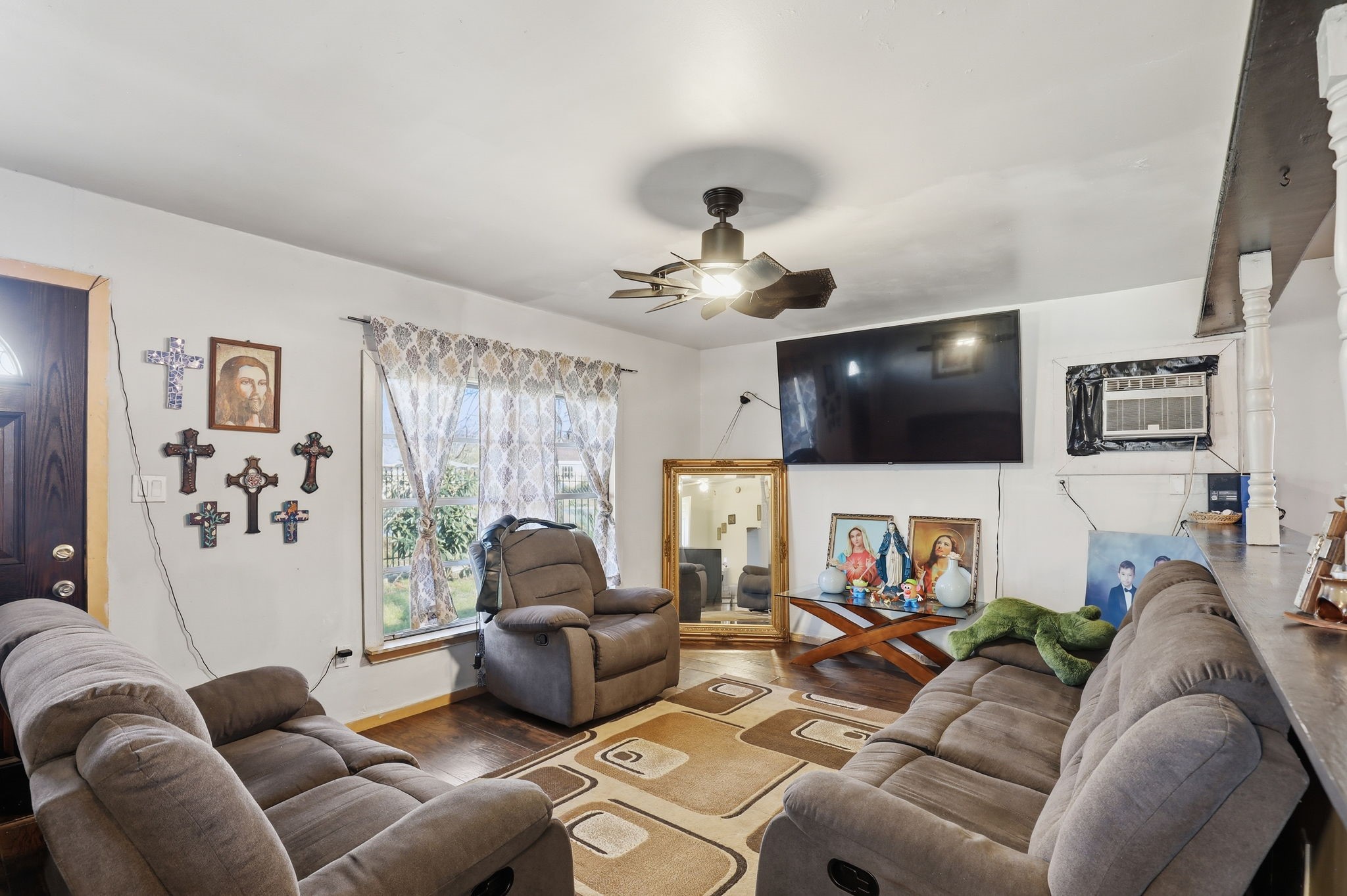 829 Becker Street Channelview, TX 77530 - Photo 4 of 19 a living room with furniture and a flat screen tv