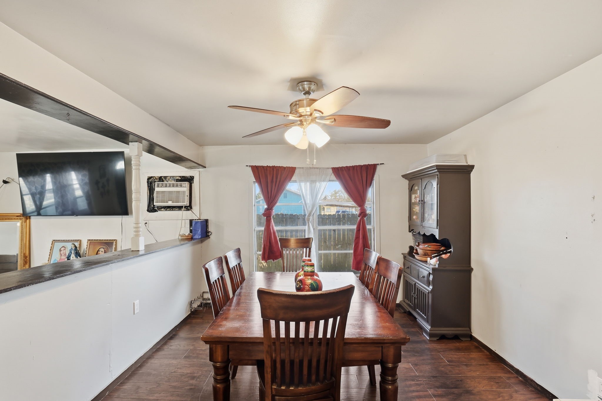 829 Becker Street Channelview, TX 77530 - Photo 6 of 19 a view of a dining room with furniture window and wooden floor