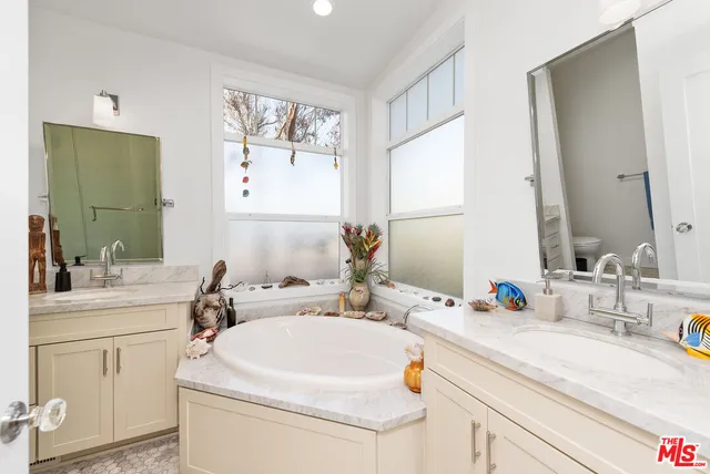 a room with furniture and a window