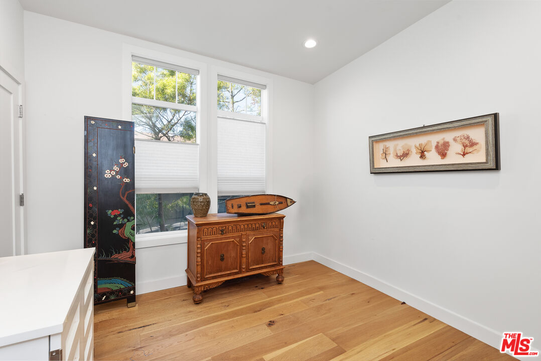 29500 Heathercliff Road, Unit 16 Malibu, CA 90265 - Photo 20 of 25 a room with furniture and a window