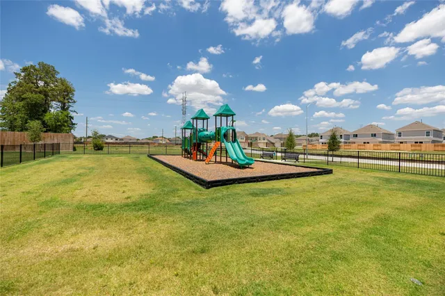 a view of a swimming pool with an outdoor space and seating area