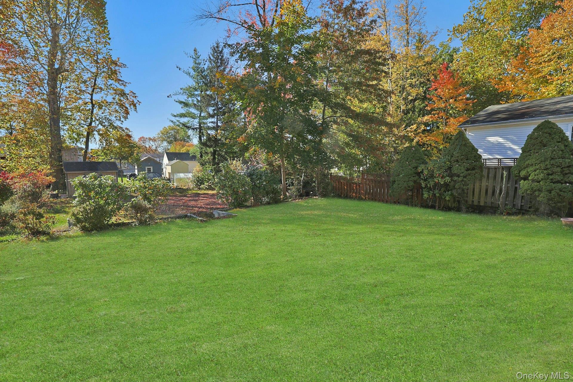 86 Braunsdorf Road Pearl River, NY 10965 - Photo 35 of 38 a view of a backyard with large trees