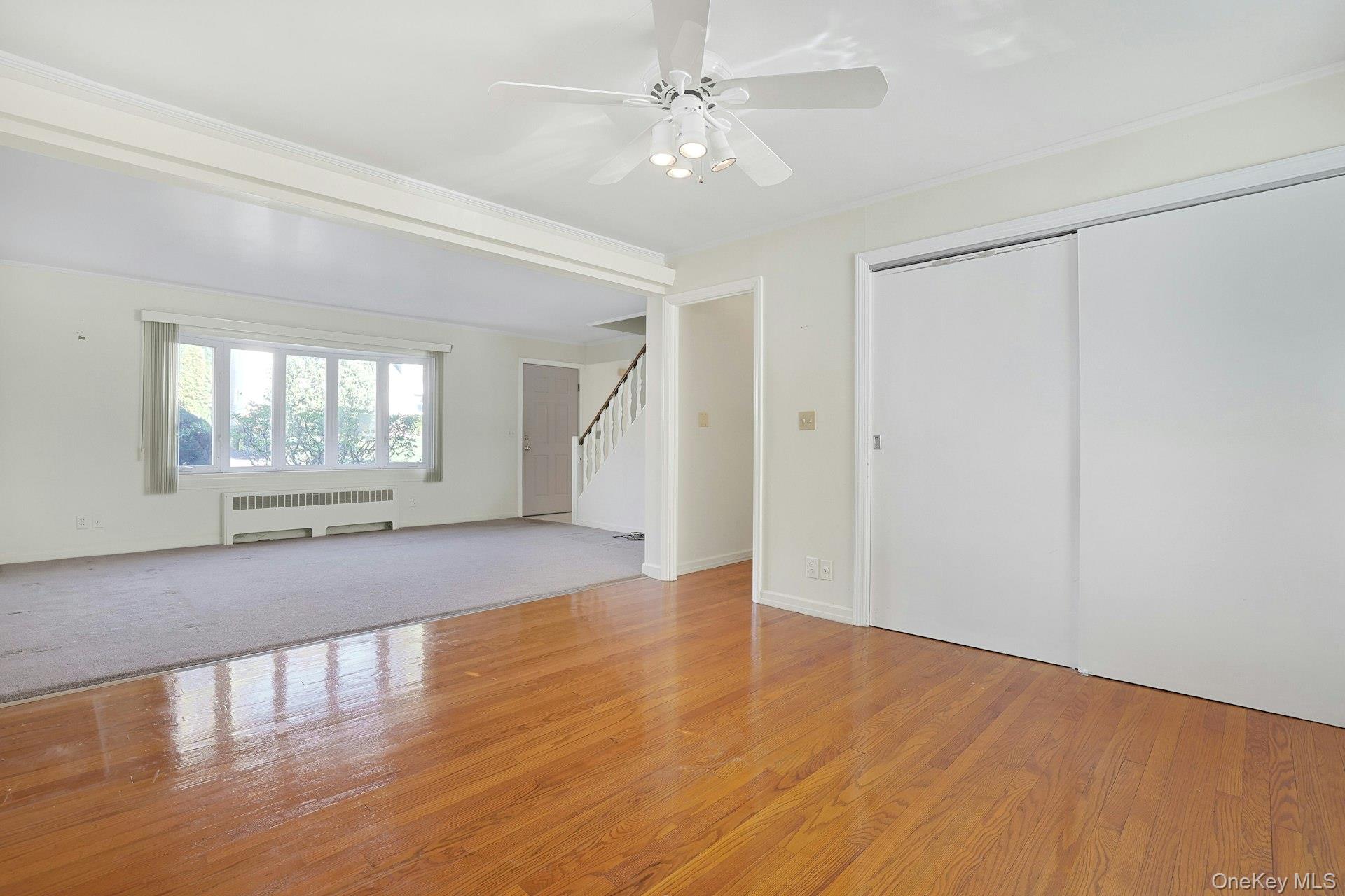 86 Braunsdorf Road Pearl River, NY 10965 - Photo 7 of 38 wooden floor in an empty room with a window