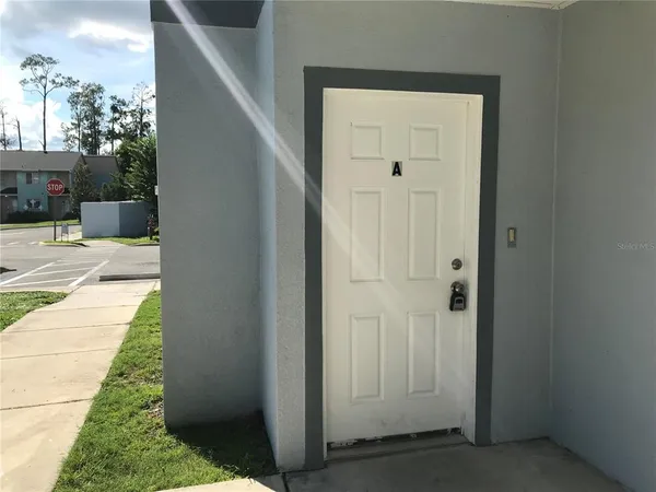 a view of a bedroom from a hallway
