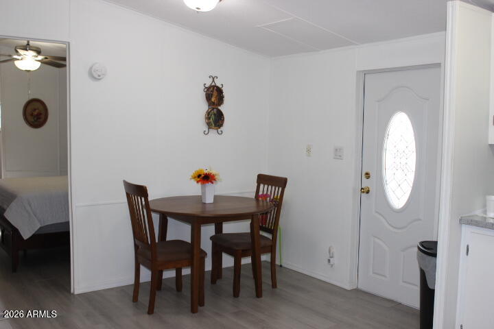 9501 East Broadway Road, Unit 101 Mesa, AZ 85208 - Photo 11 of 24 a view of a room with furniture and mirror