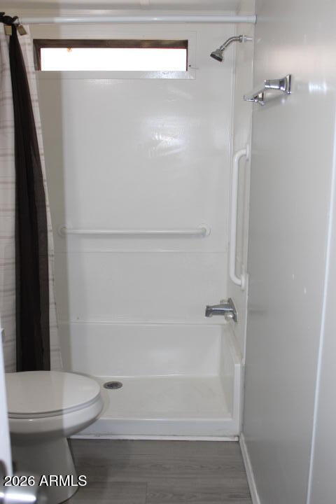 9501 East Broadway Road, Unit 101 Mesa, AZ 85208 - Photo 18 of 24 a bathroom with a toilet and a shower