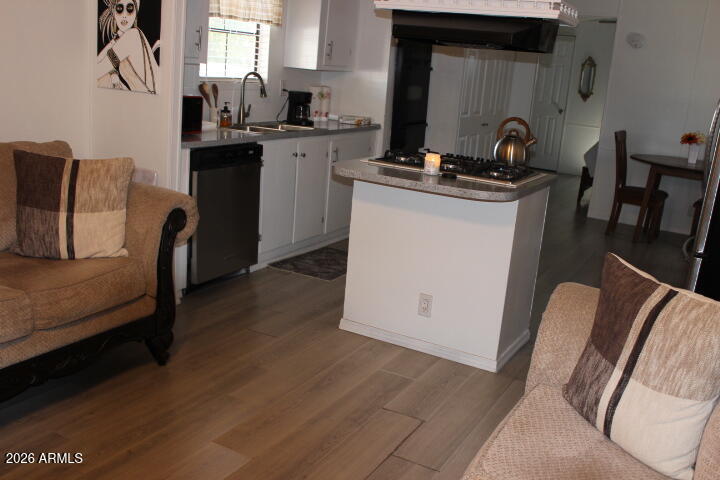 9501 East Broadway Road, Unit 101 Mesa, AZ 85208 - Photo 6 of 24 a view of kitchen with sink and mirror