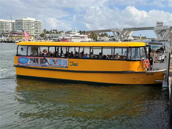 a view of a swimming pool with a lounge chairs