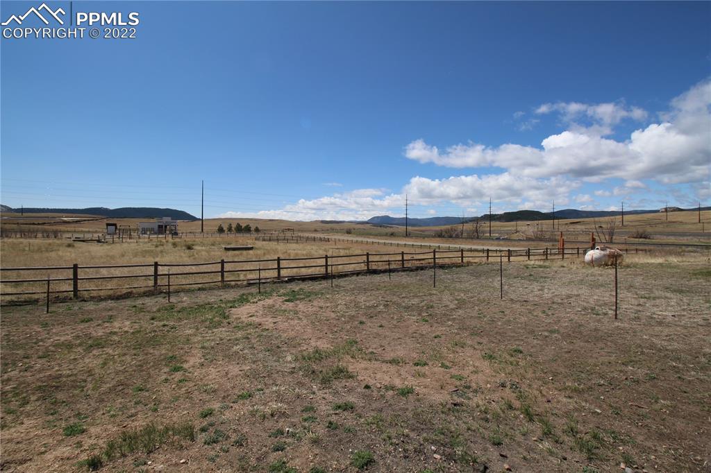 1526 Noe Road Larkspur, CO 80118 - Photo 29 of 29 a view of a road with an outdoor space