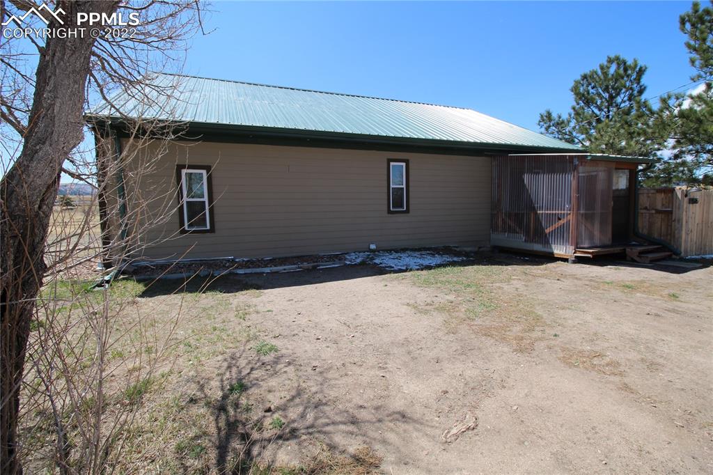 1526 Noe Road Larkspur, CO 80118 - Photo 3 of 29 a front view of a house