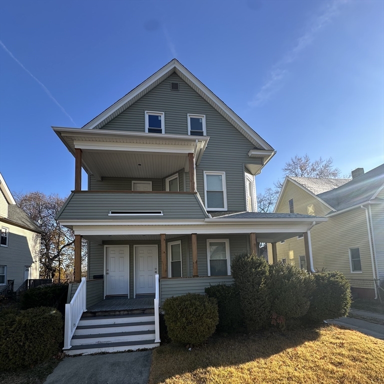 37 Cortland Street, Unit 1 Springfield, MA 01109 - Photo 14 of 14 a front view of a house with a yard