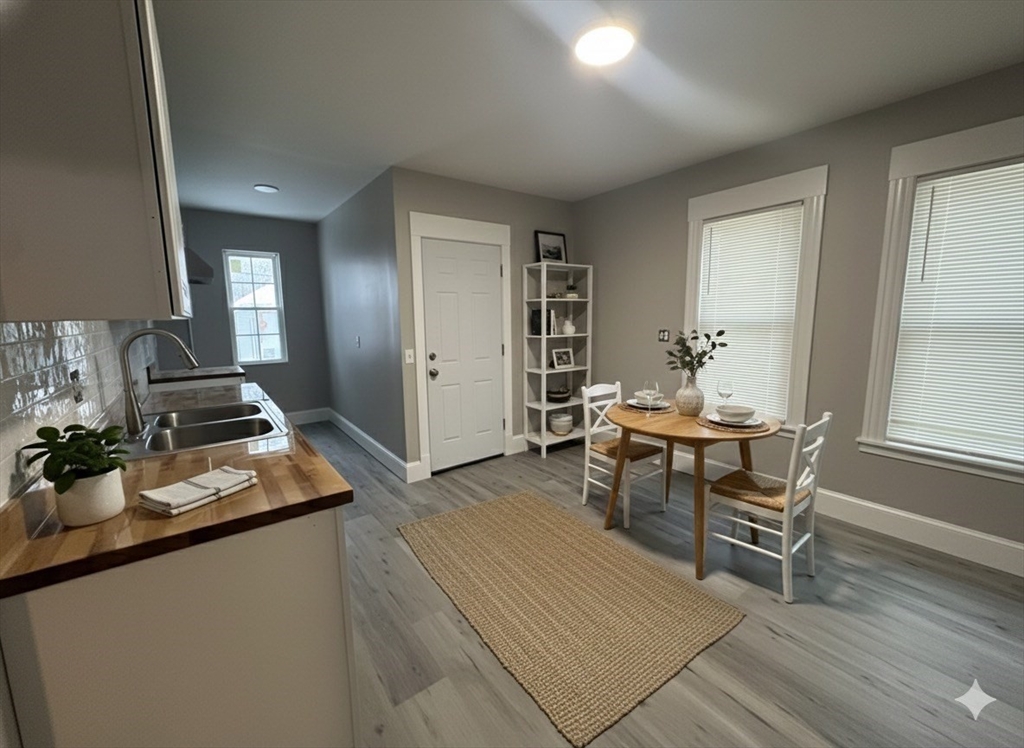 37 Cortland Street, Unit 1 Springfield, MA 01109 - Photo 5 of 14 a living room with furniture and wooden floor