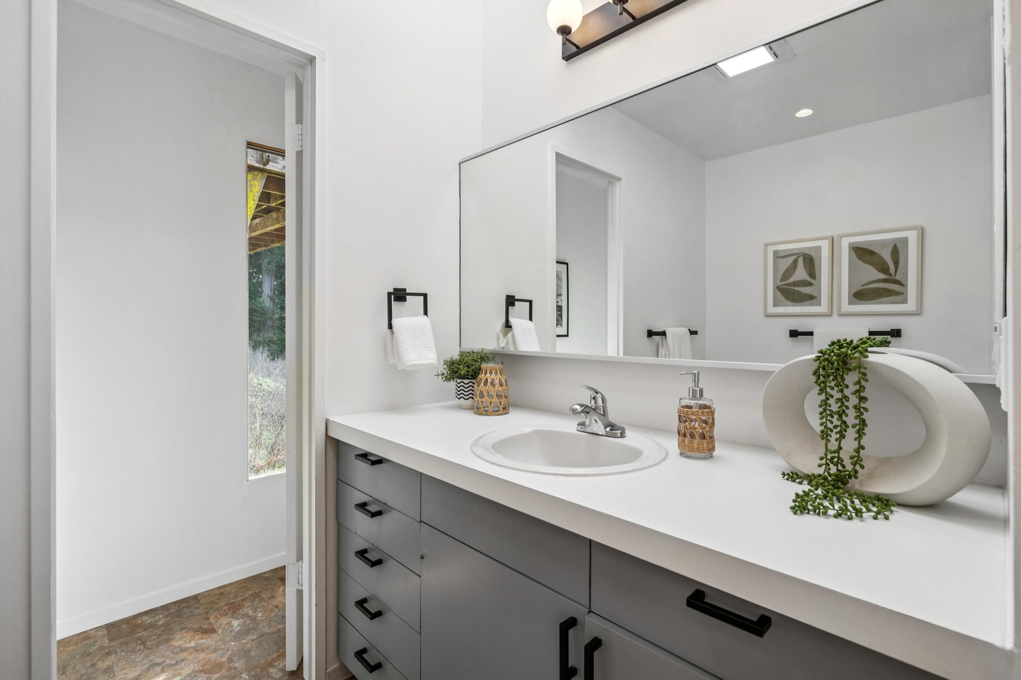 1024 Miller Avenue Berkeley, CA 94708 - Photo 32 of 60 Bathroom with vanity and stone finish floors