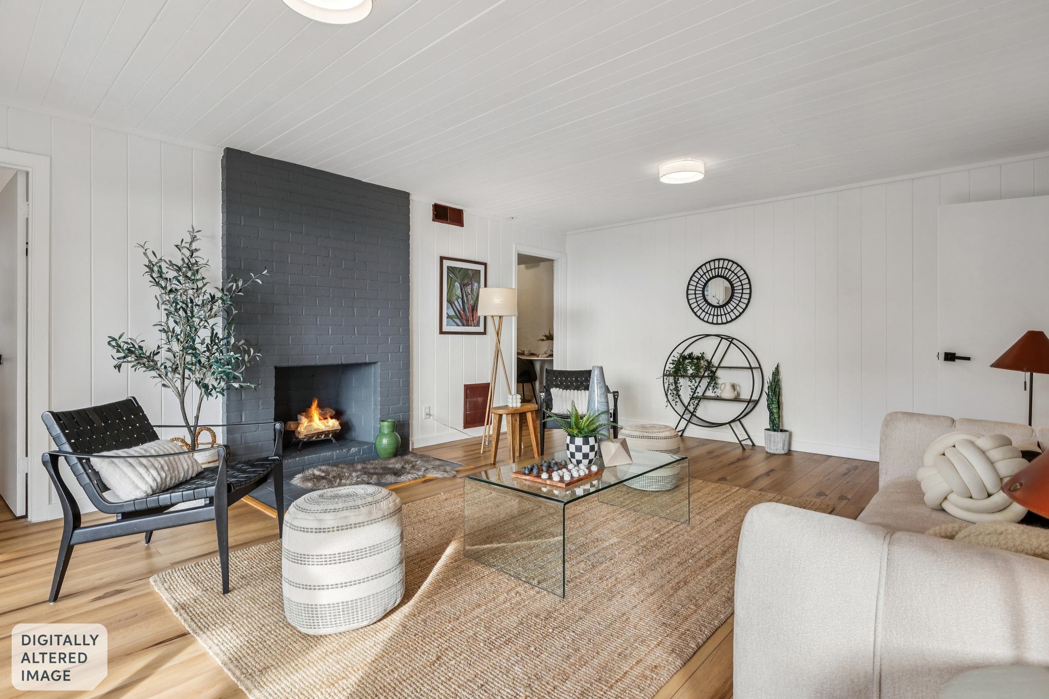 1024 Miller Avenue Berkeley, CA 94708 - Photo 34 of 60 Living area with a fireplace, wood finished floors, and wood walls