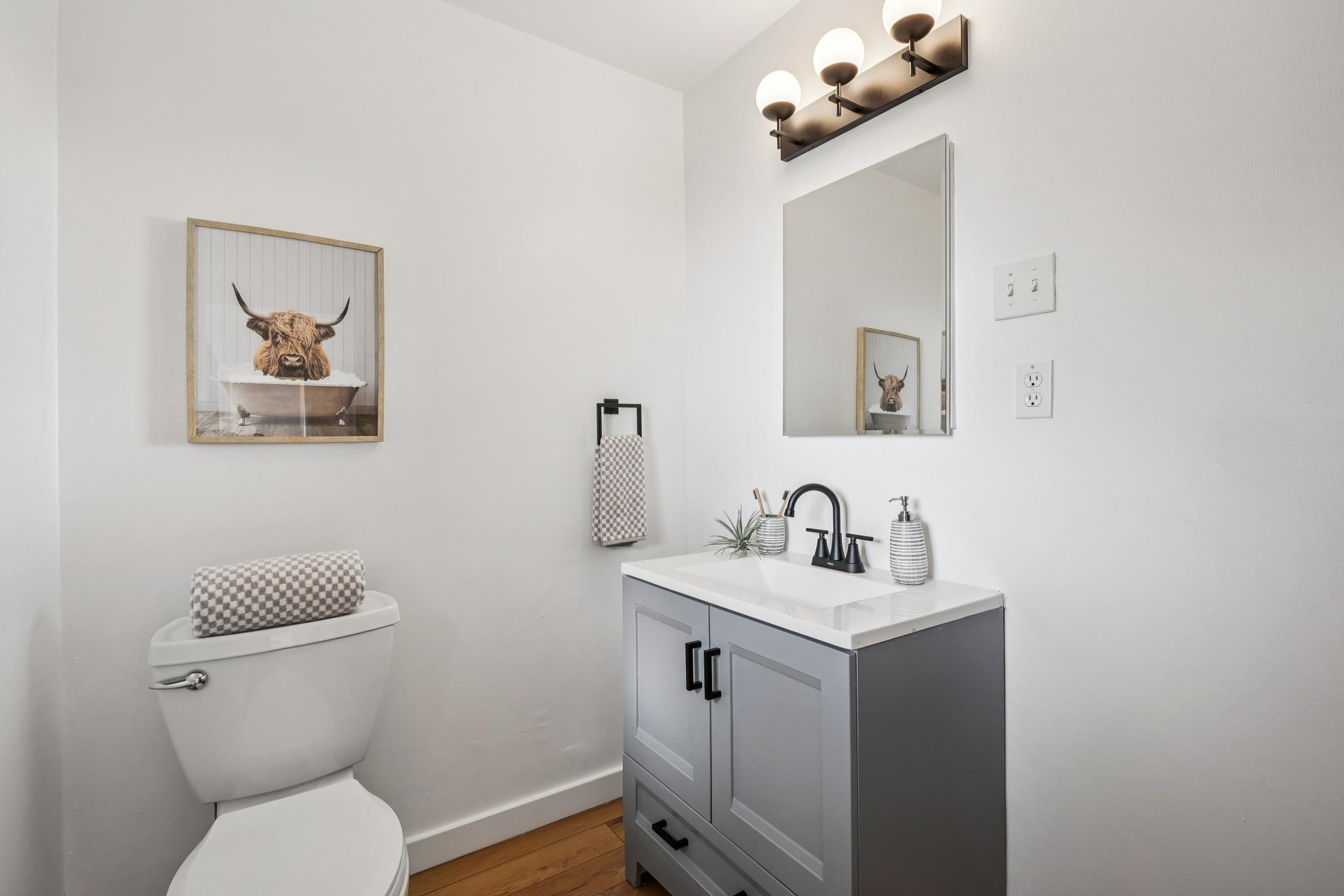 1024 Miller Avenue Berkeley, CA 94708 - Photo 44 of 60 Bathroom with vanity and wood finished floors