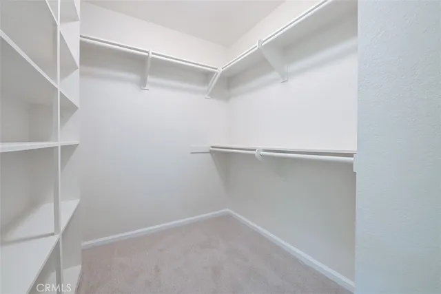 a view of an empty walk in closet