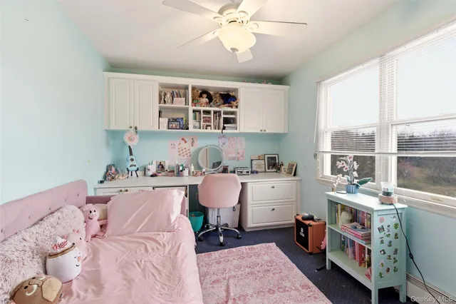 a bed room with a bed and a window