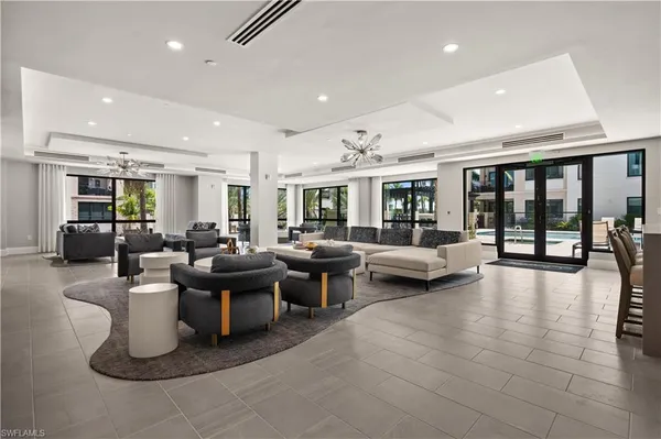 a living room with furniture and a table