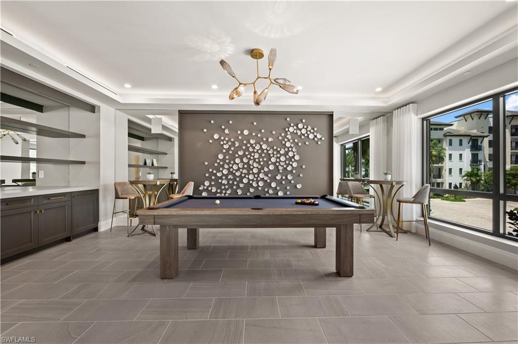 1130 3rd Avenue South, Unit 309 Naples, FL 34102 - Photo 24 of 29 a view of lobby with furniture and windows