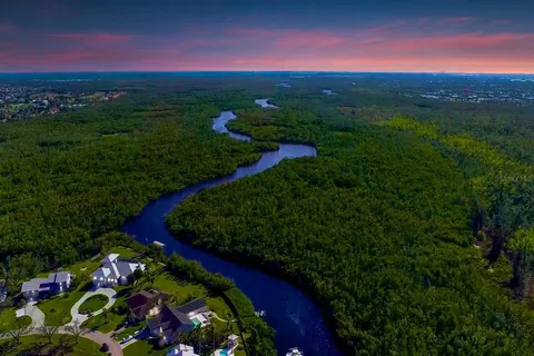 a view of a lake with houses