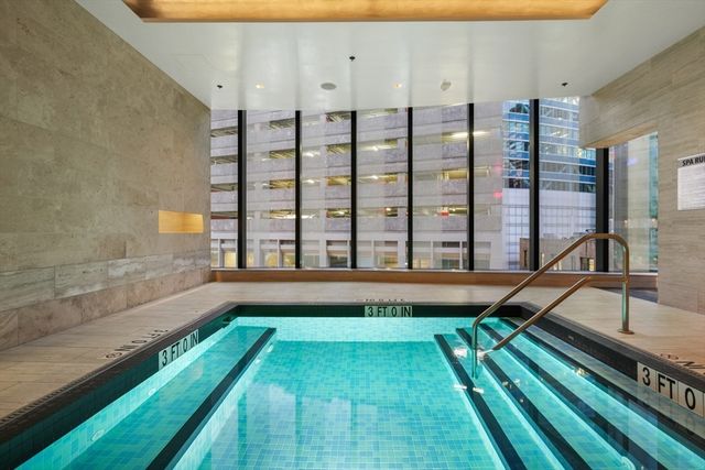 a view of a projector room with projector and furniture