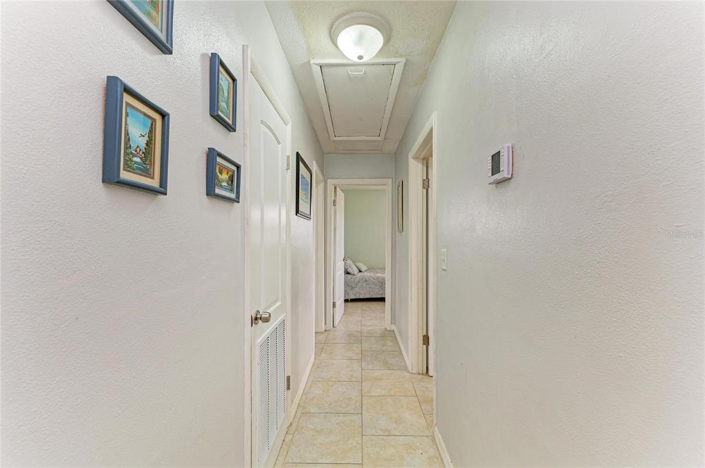 4424 87th St Court West Bradenton, FL 34210 - Photo 27 of 40 a view of a hallway with front door