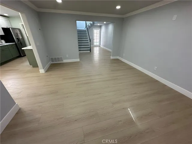 a bathroom with a sink mirror vanity and toilet