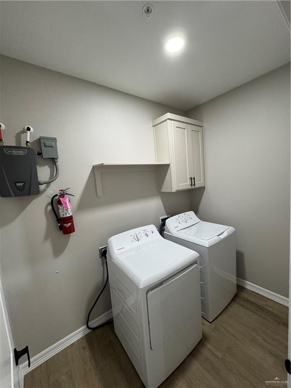 800 Ragland Road, Unit 10 Mission, TX 78572 - Photo 12 of 13 a utility room with dryer and washer