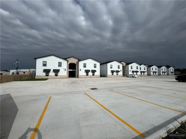 a kitchen with a sink and stove