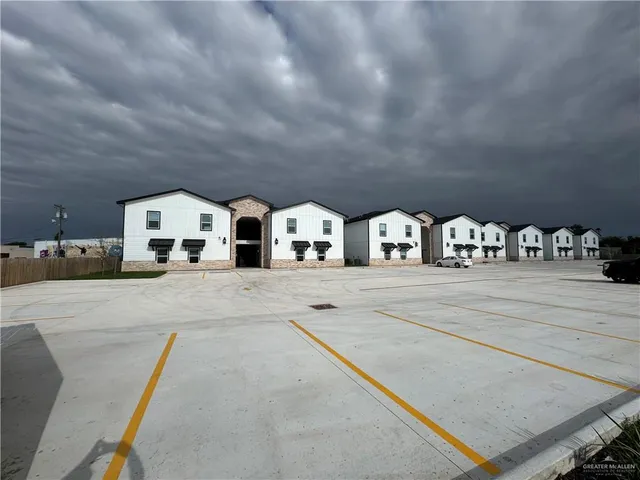 a kitchen with a sink and stove