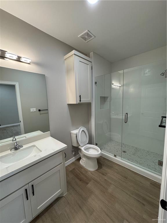 800 Ragland Road, Unit 10 Mission, TX 78572 - Photo 8 of 13 a bathroom with a sink toilet and shower