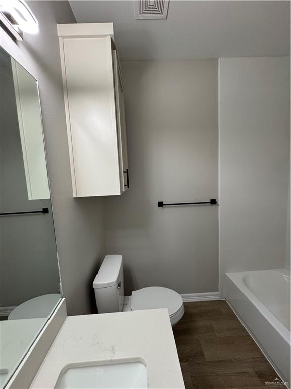 800 Ragland Road, Unit 10 Mission, TX 78572 - Photo 10 of 13 a bathroom with a toilet and sink