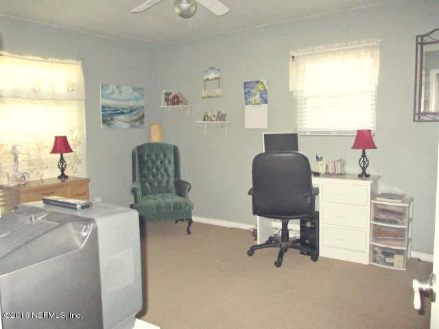96726 Blackrock Road Yulee, FL 32097 - Photo 18 of 27 a workspace with furniture and a window