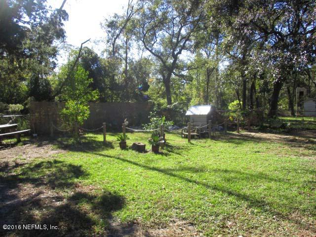 96726 Blackrock Road Yulee, FL 32097 - Photo 21 of 27 a garden with wooden fence