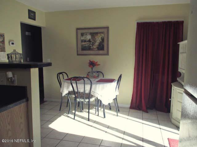 96726 Blackrock Road Yulee, FL 32097 - Photo 9 of 27 a view of a dining room with furniture