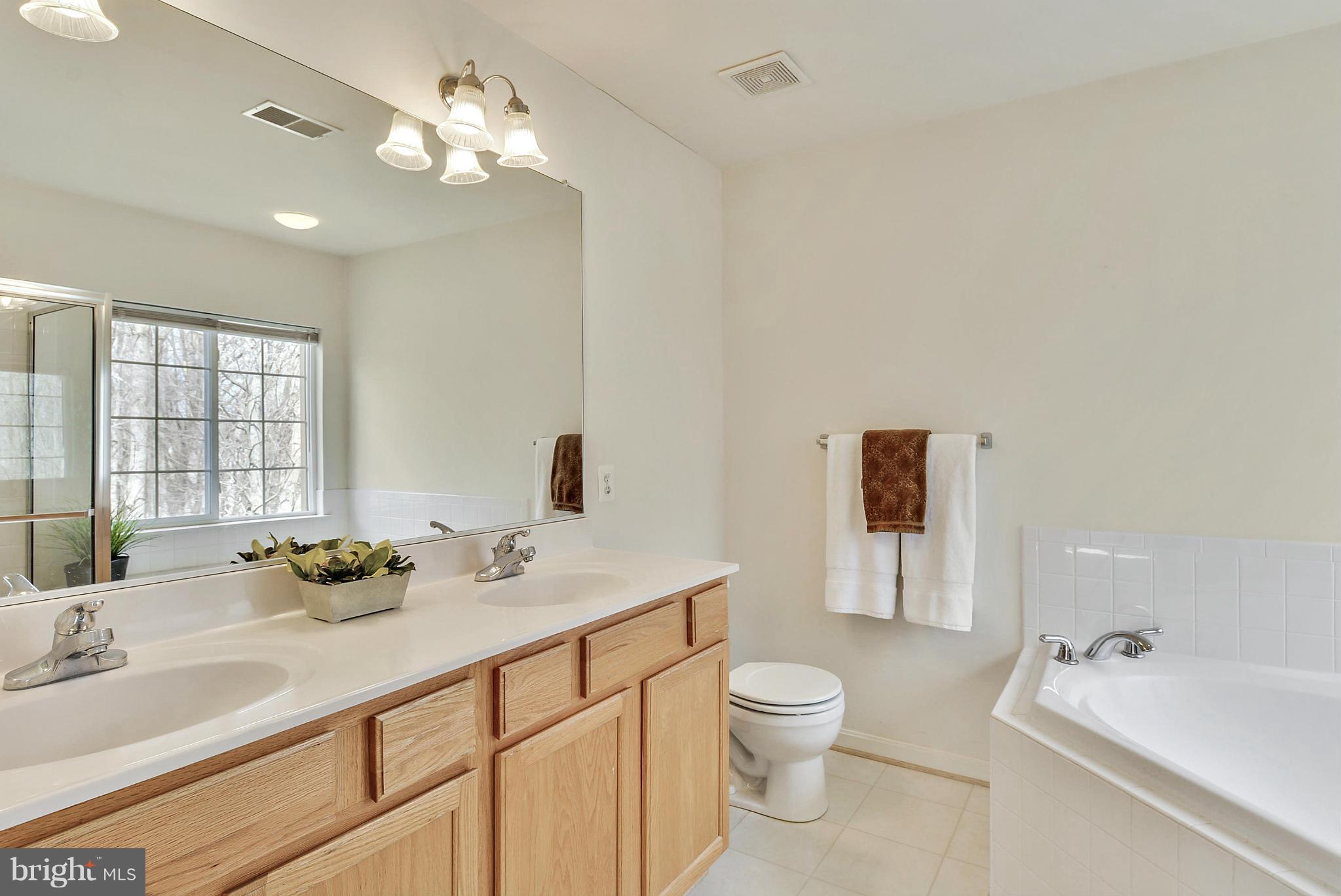 18858 Broken Oak Road Boyds, MD 20841 - Photo 14 of 30 Dual Sinks and Tasteful Neutral Finishes