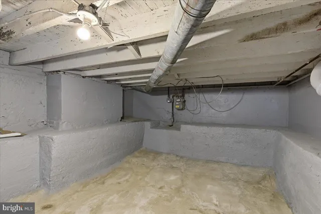 a view of a balcony with wooden floor and fence