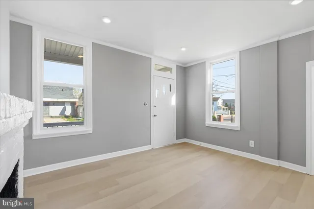 a view of an empty room with a window