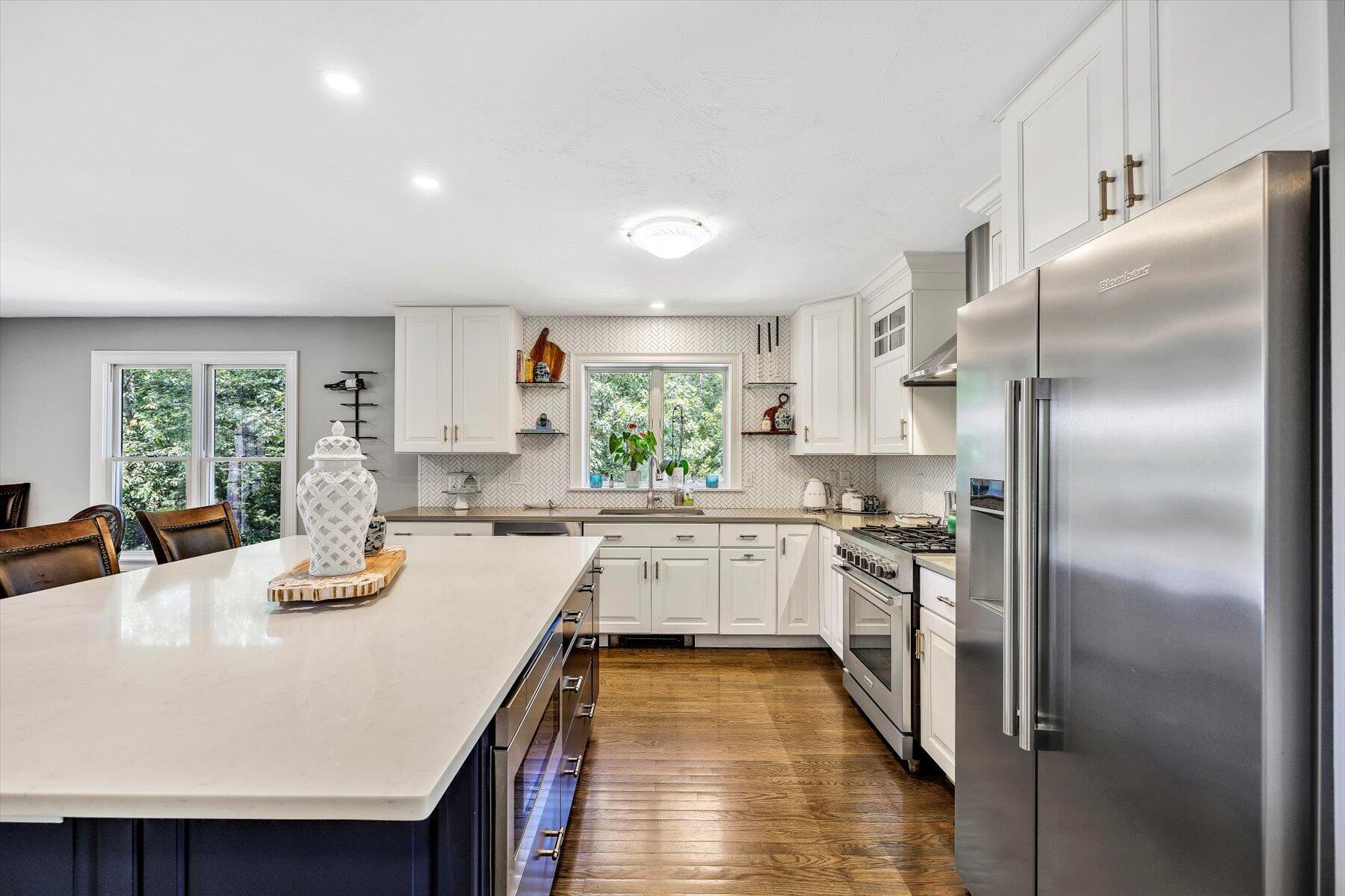 1 Ravens Nest Road Sandwich, MA 02563 - Photo 8 of 46 a kitchen with granite countertop a refrigerator stove top oven and sink