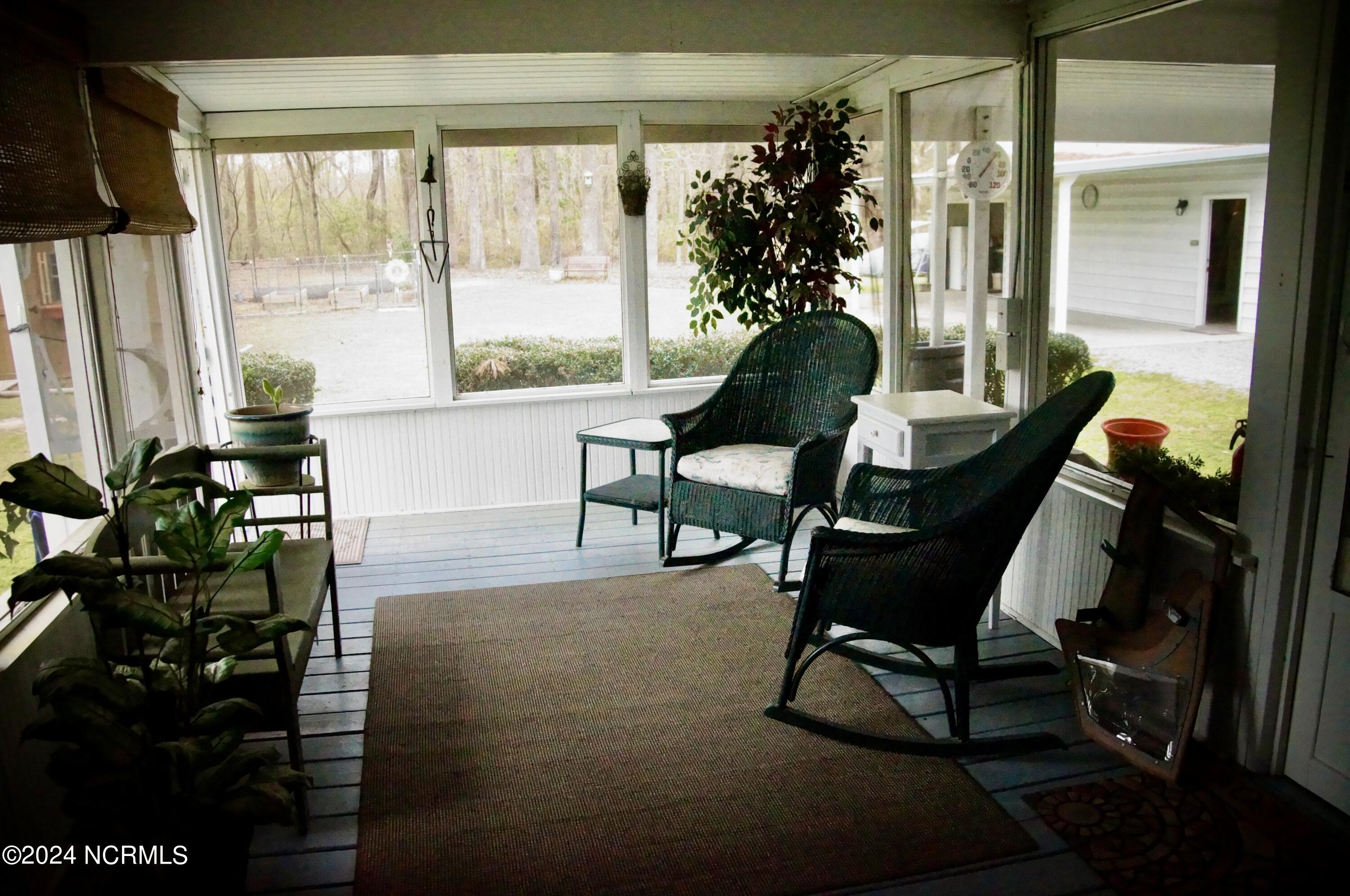740 Taylor Heath Road Kinston, NC 28501 - Photo 36 of 37 Screened in back porch
