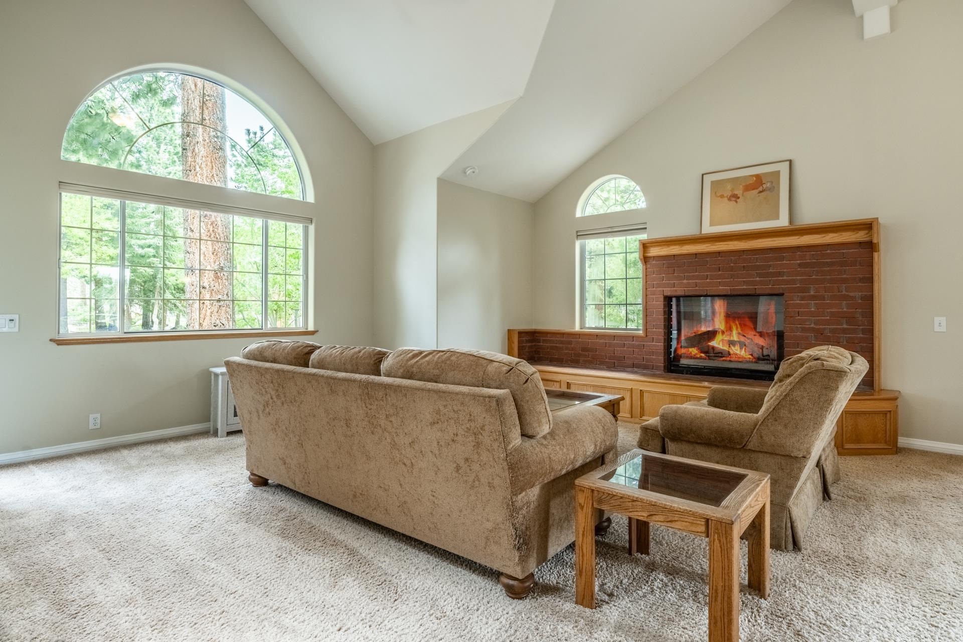 272 Ridge Way Mammoth Lakes, CA 93546 - Photo 10 of 55 Living area featuring vaulted ceilings and abundant natural light