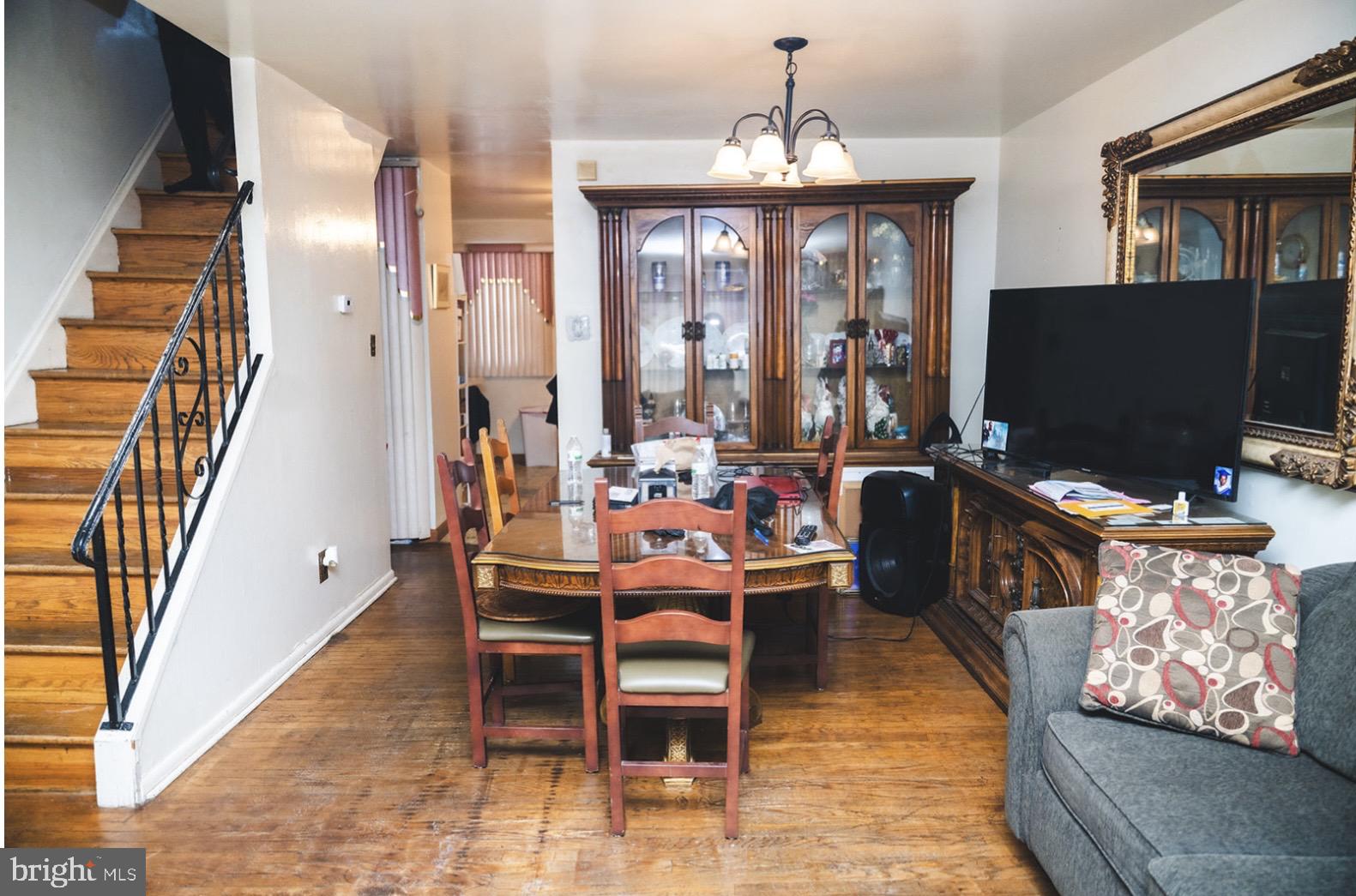 6021 Chestnut Street Philadelphia, PA 19139 - Photo 3 of 21 a dining room with wooden floor and breakfast area