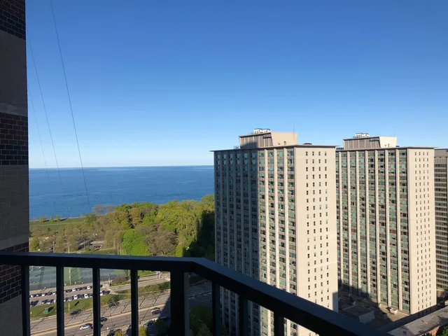 a view of balcony with furniture